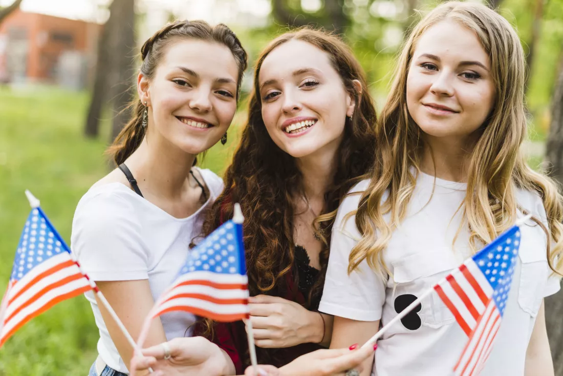smiling-girls-nature-with-american-flags