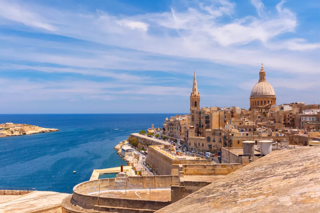 view-from-domes-churches-roofs-with-church-our-lady-mount-carmel-st-paul-s-anglican-pro-cathedral-valletta-capital-city-malta